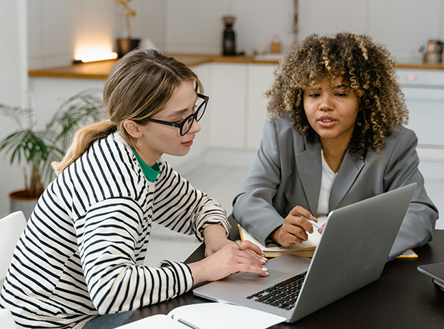 Two people discussing image