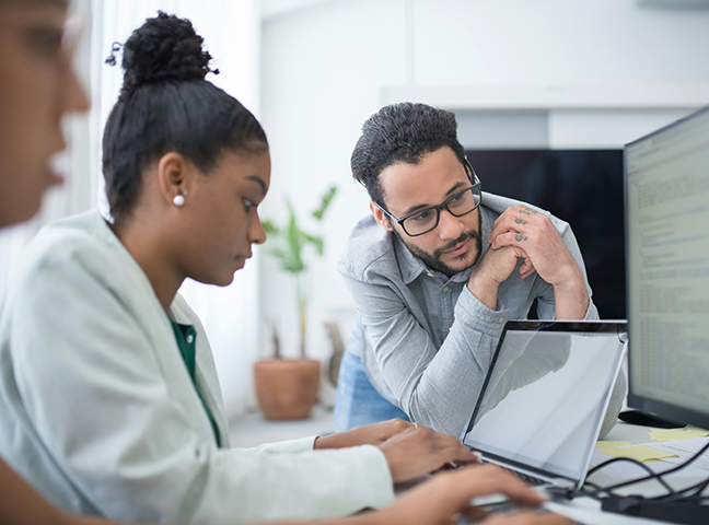 Two people discussing image